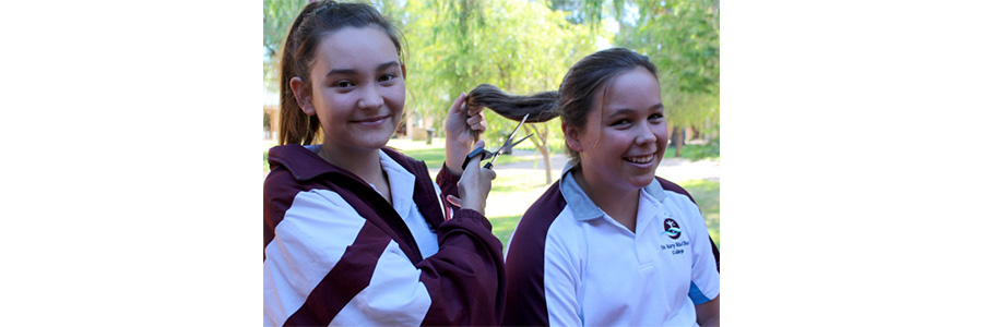 Girls lose locks for a cause
