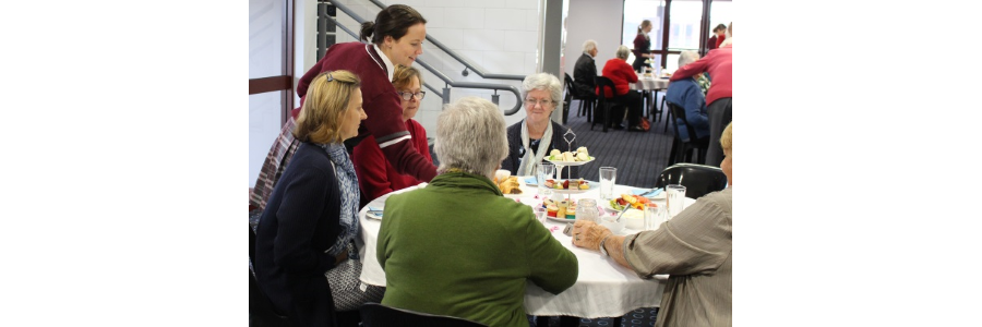 Hospitality students host parishioners for a high tea