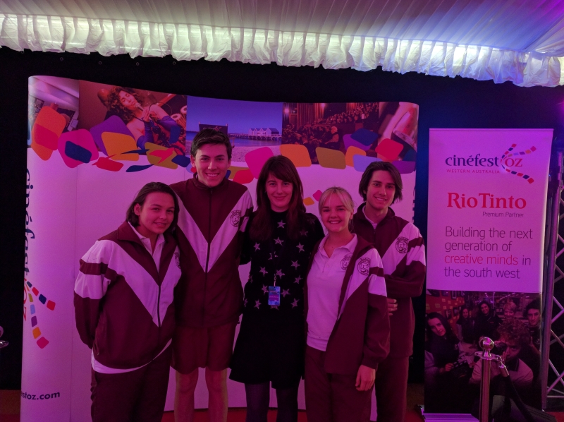 students-with-director-of-the-ravens
