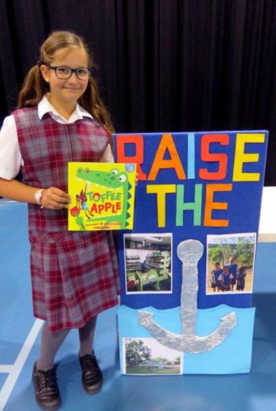 tasmin-with-her-donated-book